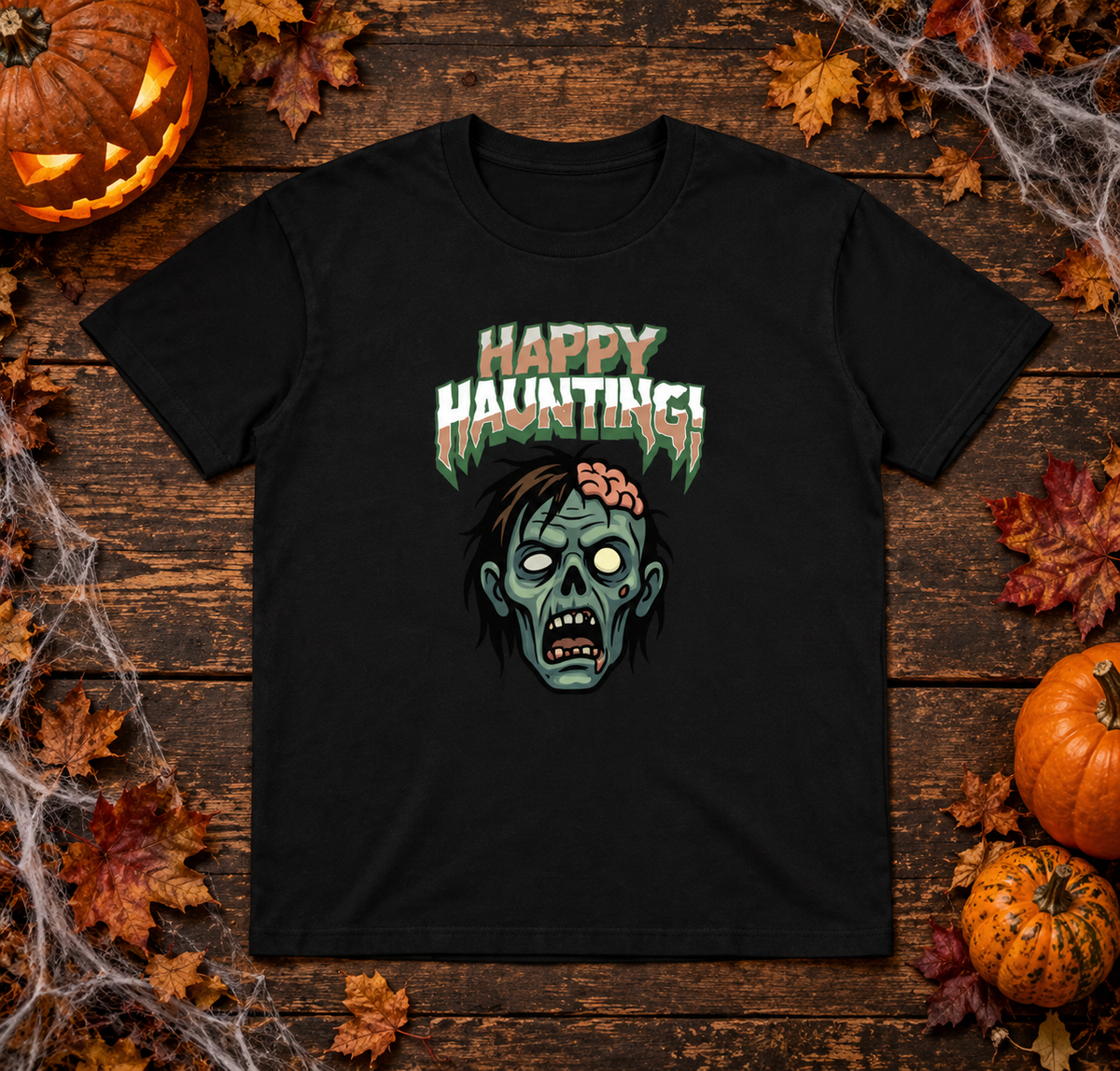 Black Happy Haunting zombie T-shirt Halloween flat lay with pumpkins