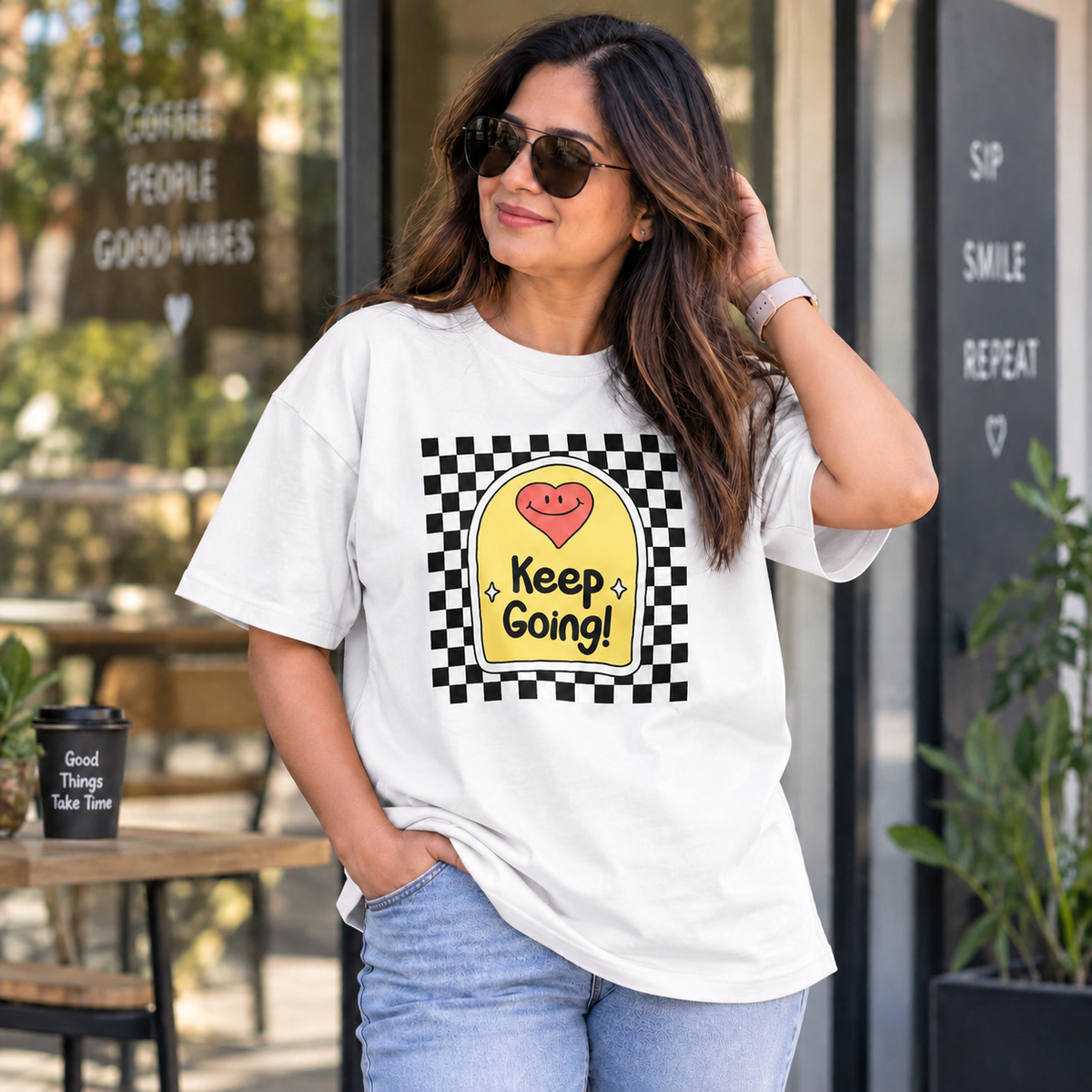 White lifestyle mockup — Keep Going — matching existing oversized T-shirt fit