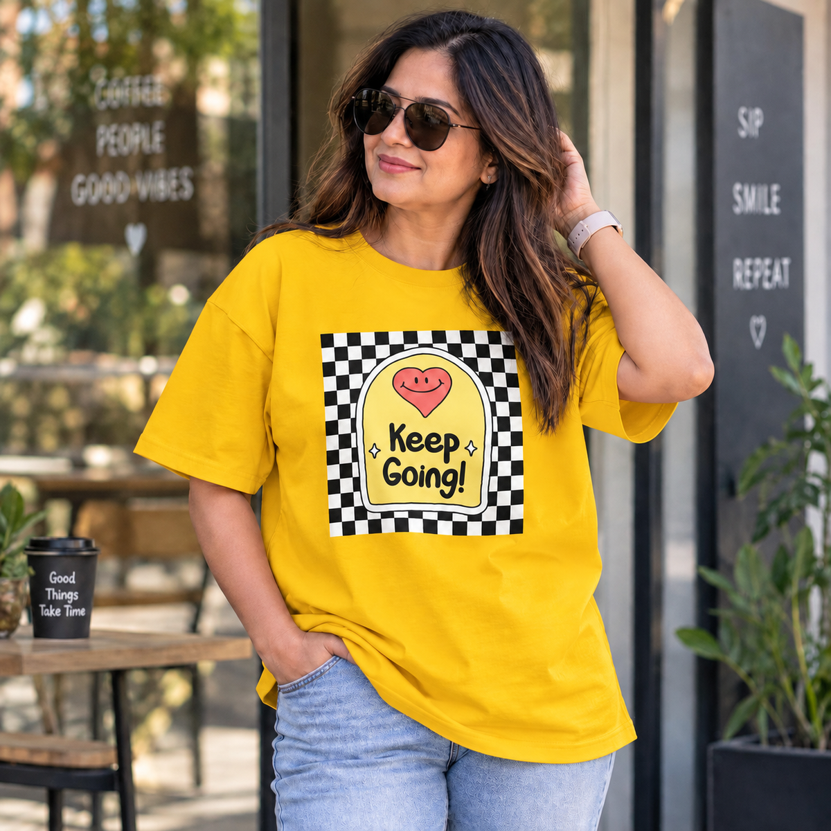 Yellow lifestyle mockup — Keep Going — matching existing oversized T-shirt fit