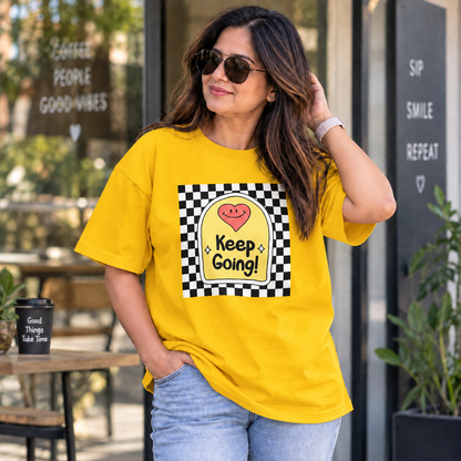 Yellow lifestyle mockup — Keep Going — matching existing oversized T-shirt fit